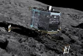Lost comet lander awakes, sends `hello` from space